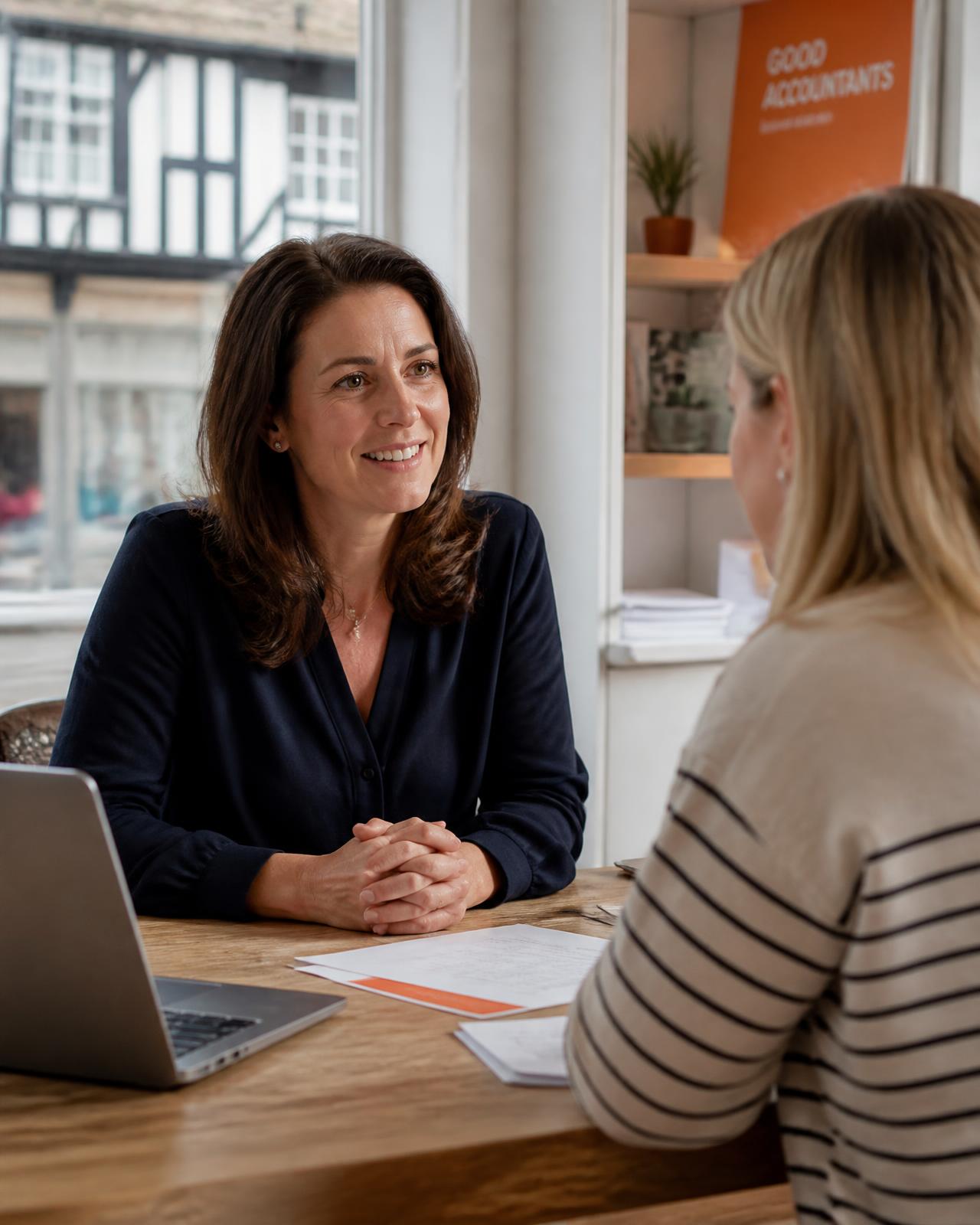 An adviser talking through figures with a client